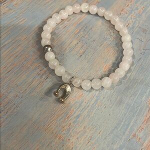 Elegant White Beaded Bracelet with Silver Accents